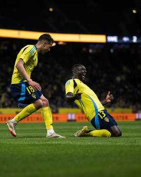 Yasin Ayari and Ken Sema of Sweden celebrate the 3-0 goal