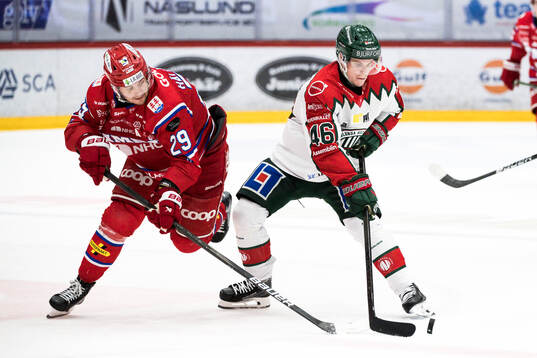 Timrås Filip Hållander och Frölundas Dominik Egli