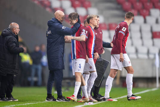 Head coach Ståle Solbakken and David Møller Wolfe of