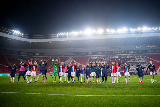 Players of Norway celebrate
