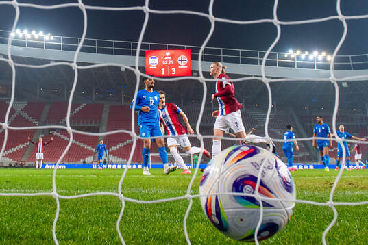 Erling Braut Haaland of Norway celebrates with teammate