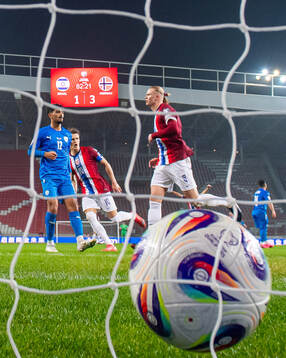 Erling Braut Haaland of Norway celebrates with teammate