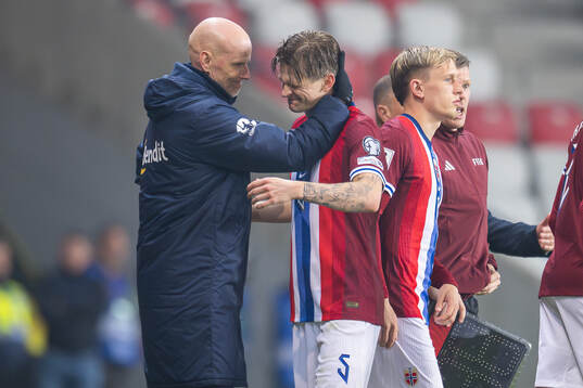 Head coach Ståle Solbakken and David Møller Wolfe of