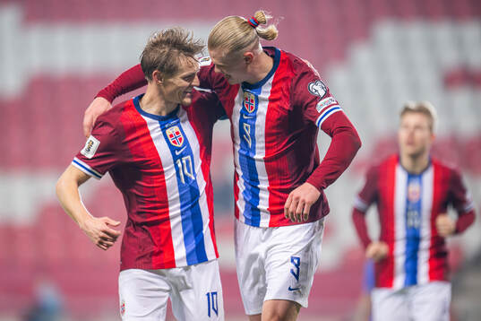 Erling Braut Haaland of Norway celebrates with teammate