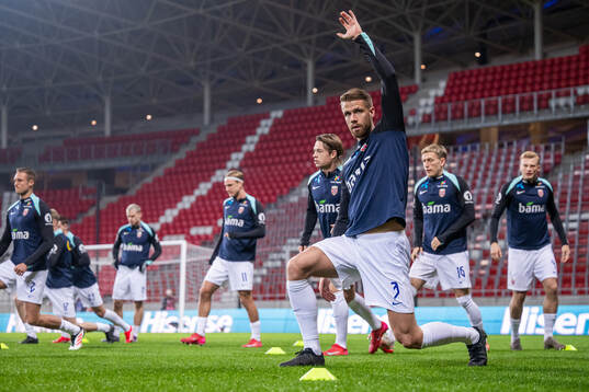 Kristoffer Ajer of Norway warms up