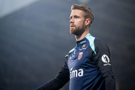 Kristoffer Ajer of Norway warms up