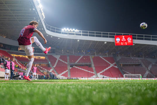 Martin Ødegaard of Norway takes a corner kick