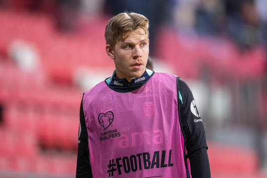 Jens Petter Hauge of Norway warms up