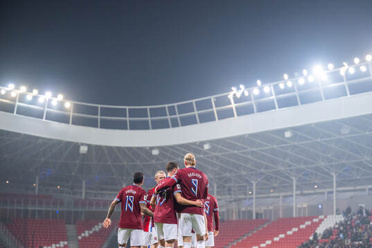 Erling Braut Haaland of Norway celebrates with teammate