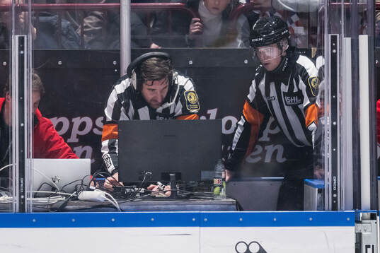 Domare Mikael Sjöqvist och Domare Johan Wedin