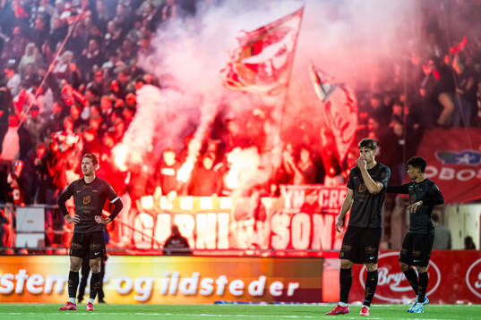 Fredrik Pallesen Knudsen and Thore Pedersen of Brann looks