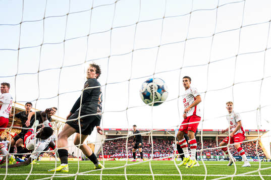 Emil Frost Holten of Fredrikstad scores the 1-0 goal