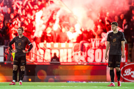 Fredrik Pallesen Knudsen and Thore Pedersen of Brann looks