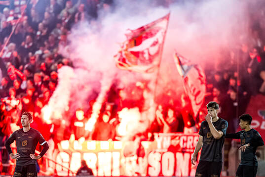Fredrik Pallesen Knudsen and Thore Pedersen of Brann looks