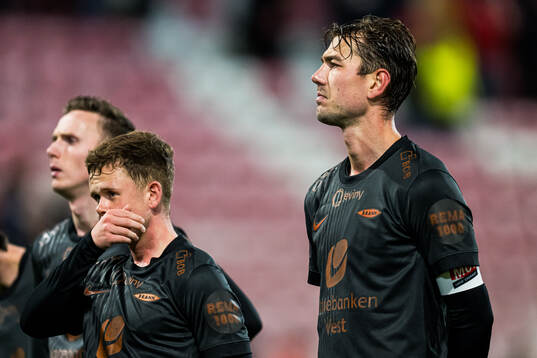 Fredrik Pallesen Knudsen of Brann looks dejected