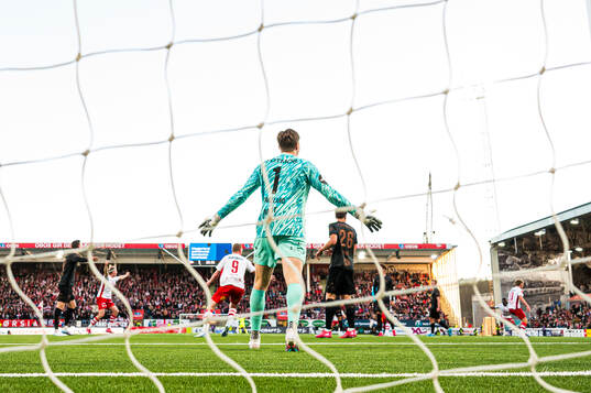 Mathias Dyngeland of Brann looks dejected