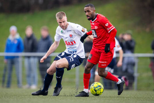 Åstorps FFs Robin Nilsson och Bergdalens IKs Mohamud Nur