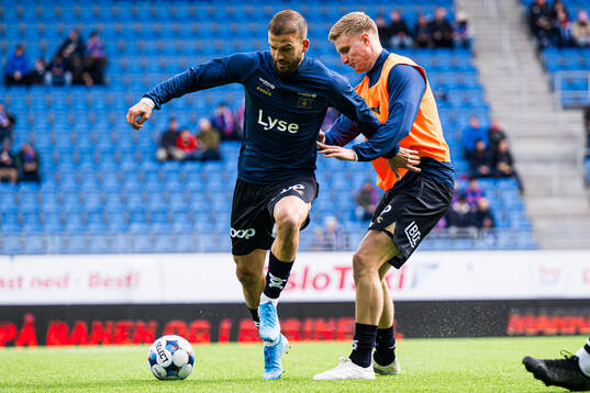 Zlatko Hovland Tripic and Martin Ove Roseth of Viking warms