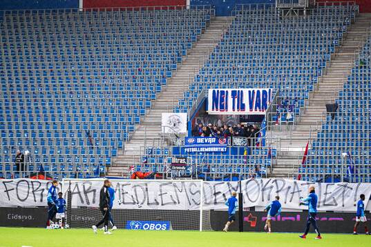 VAR banner and supporters