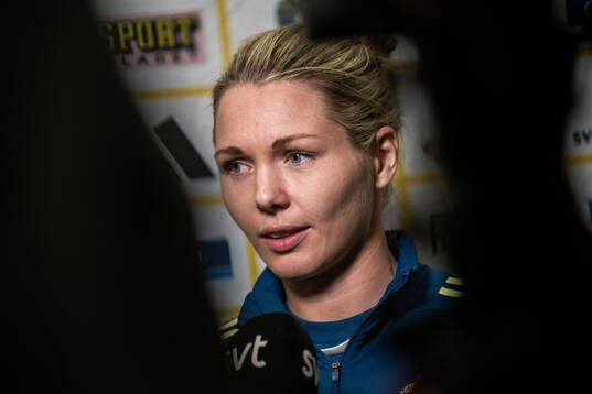 Goalkeeper Jennifer Falk is interviewed