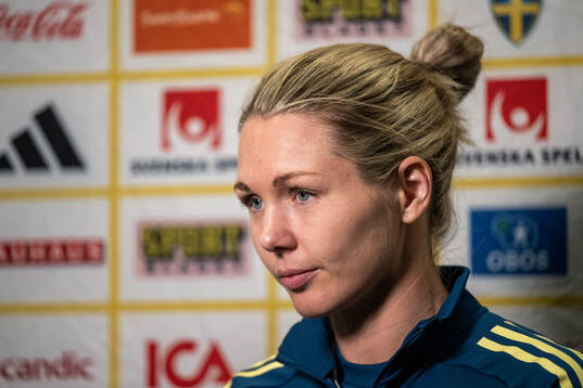 Goalkeeper Jennifer Falk is interviewed