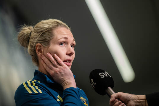 Goalkeeper Jennifer Falk is interviewed