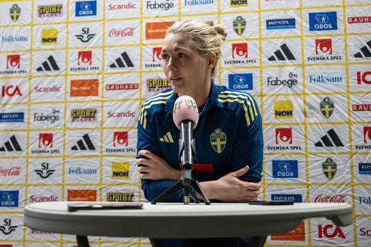 Goalkeeper Jennifer Falk is interviewed