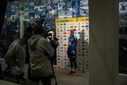 Goalkeeper Jennifer Falk is interviewed