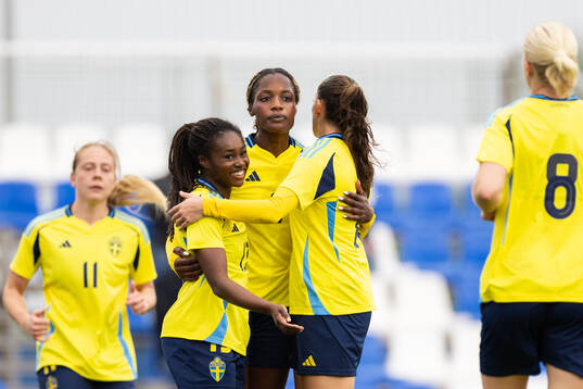 Evelyn Ijeh of Sweden celebrates with Monica Jusu Bah and