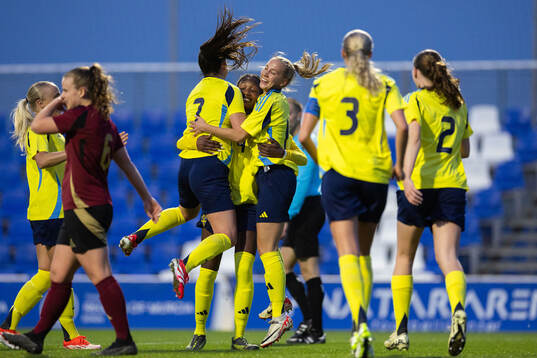 Evelyn Ijeh of Sweden celebrates with Emilia Pelgander and