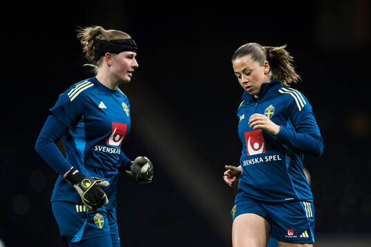Goalkeeper Tove Enblom and Cornelia Kapocs of the Swedish