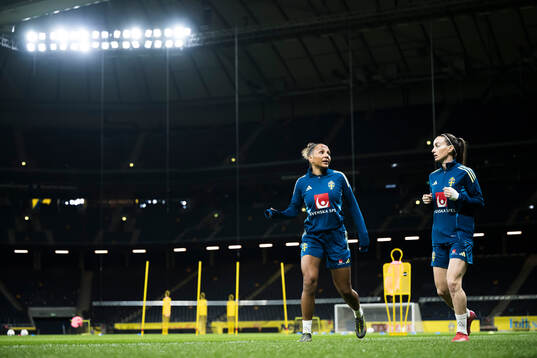 Madelen Janogy and Kosovare Asllani of the Swedish women's