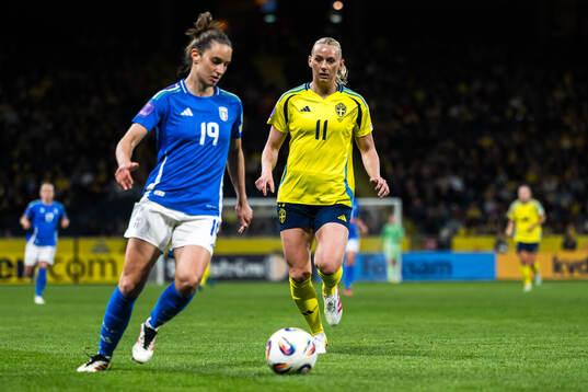 Martina Lenzini of Italy and Stina Blackstenius of Sweden
