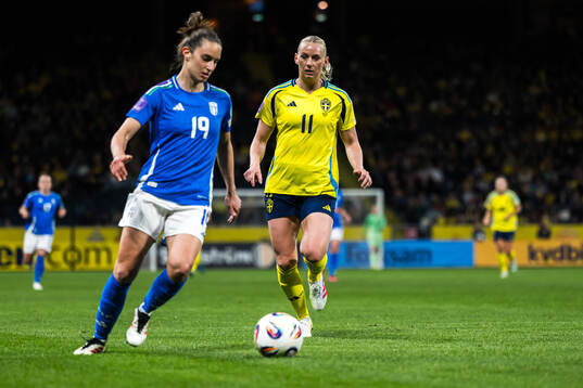 Martina Lenzini of Italy and Stina Blackstenius of Sweden