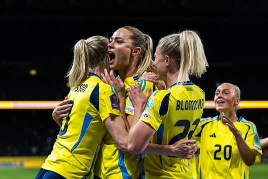 Sofia Jakobsson and Rebecka Blomqvist of Sweden celebrate