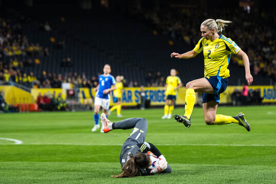 Goalkeeper Laura Giuliani of Italy and Jonna Andersson of