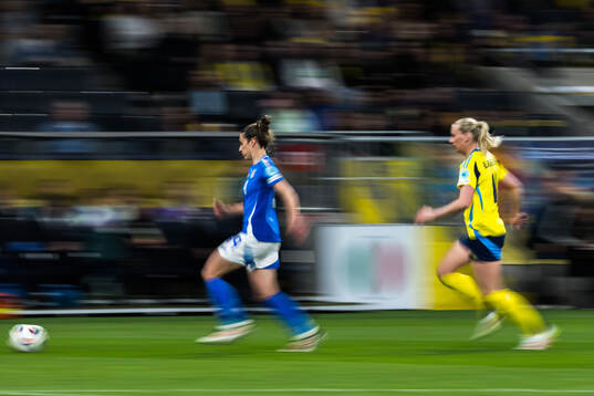 Martina Lenzini of Italy and Stina Blackstenius of Sweden