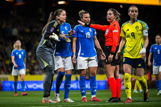 Laura Giuliani and Fridolina Rolfö of Italy react towards