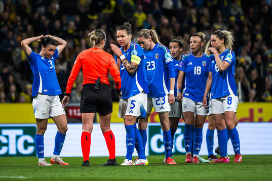 Elena Linari of Italy reacts towards referee Alina Pe?u