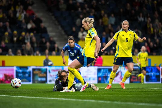 Goalkeeper Laura Giuliani of Italy and Stina Blackstenius