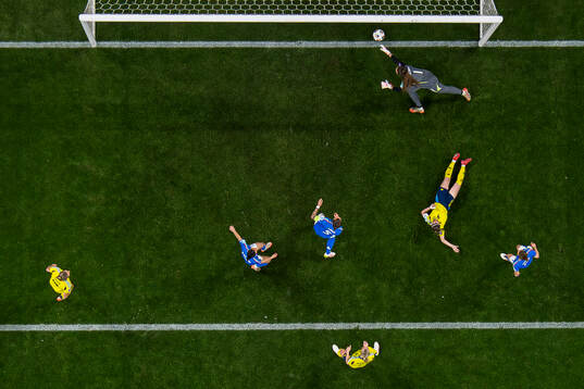 Kosovare Asllani of Sweden scores the 1-1 goal behind