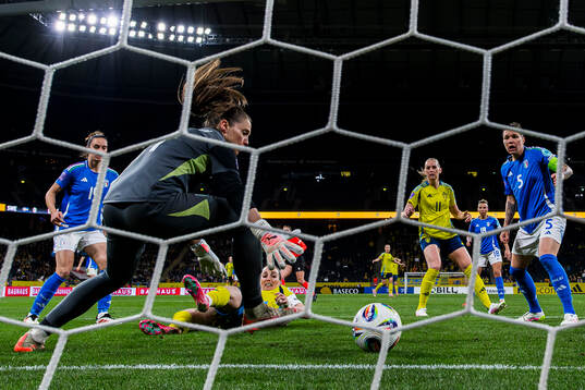 Kosovare Asllani of Sweden scores the 1-1 goal behind