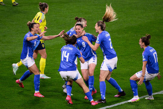 Emma Severini of Italy celebrates with team mates