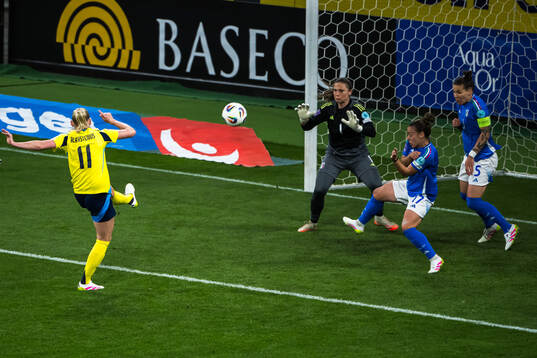 Stina Blackstenius of Sweden and goalkeeper Laura Giuliani