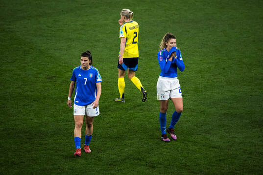 Sofia Cantore and Michela Cambiaghi of Italy look dejected