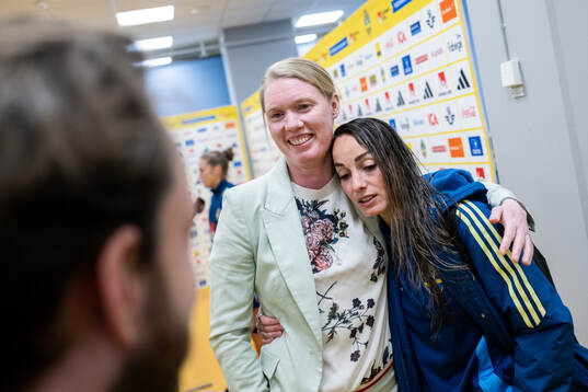 Former goalkeeper Hedvig Lindahl with Kosovare Asllani of