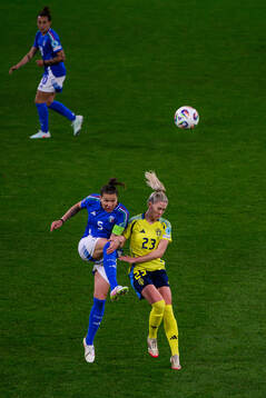 Elena Linari of Italy and Rebecka Blomqvist of Sweden