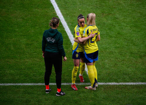 Kosovare Asllani and Rebecka Blomqvist of Sweden