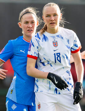 Sædis Run Heidarsdottir of Iceland and Frida Maanum of