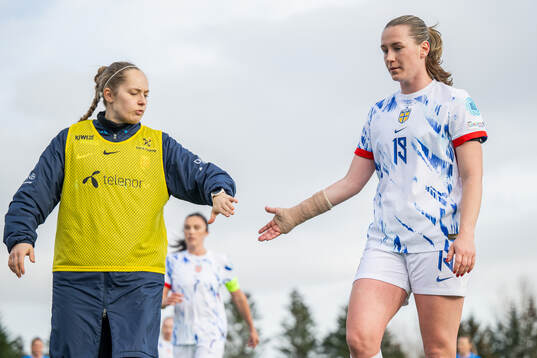 Goalkeeper Aurora Mikalsen and Elisabeth Terland of Norway
